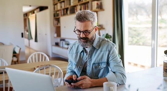 Man researching something on his phone.